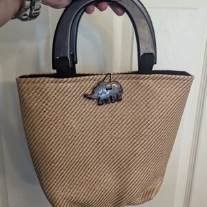 Honey B's Tan Woven Tote with Black Handles and Elephant Charm